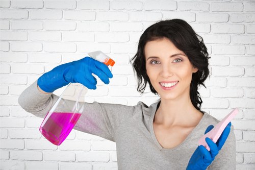 Technician assessing a carpet stain in a local property